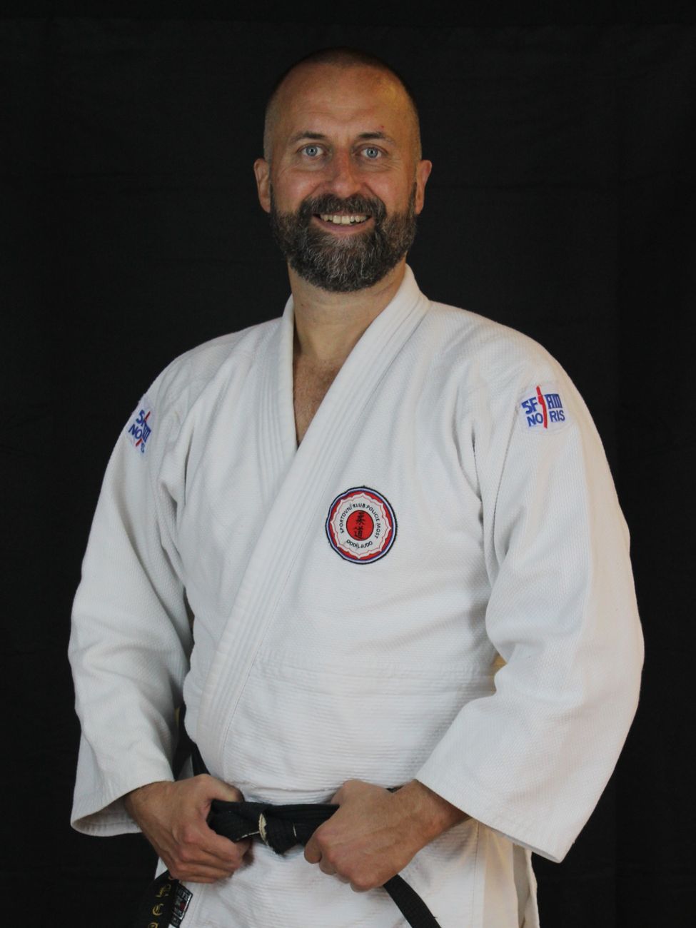 Štěpán Benca in a gi with a black belt